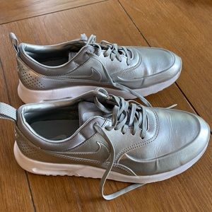 Nike sneakers; silver, women’s size 9